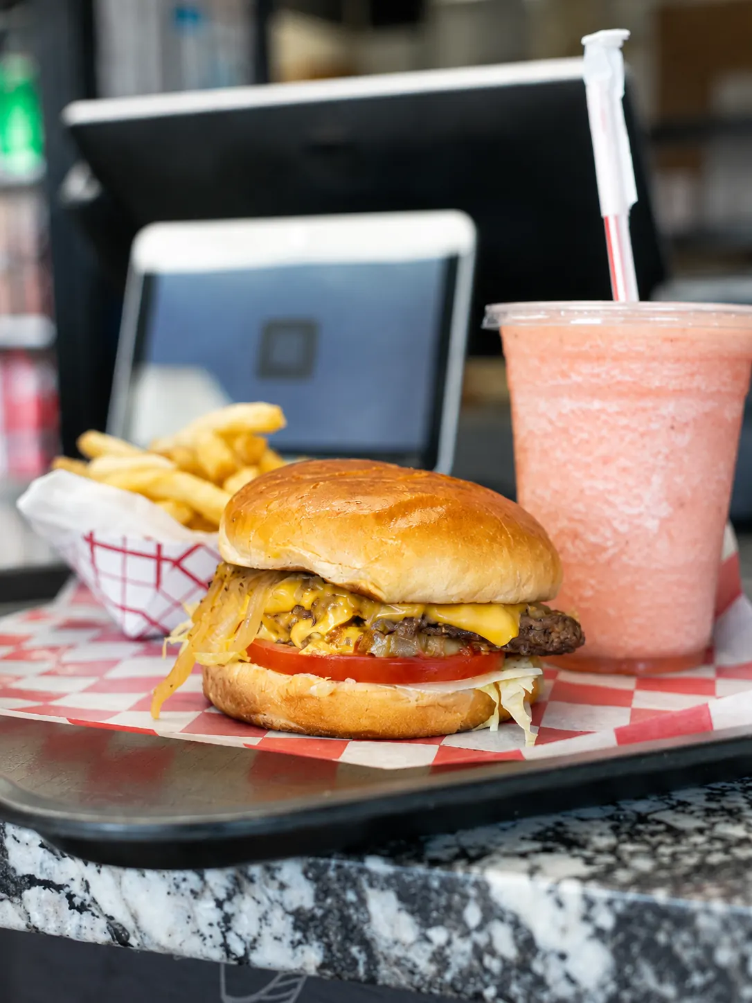 Jimmy's Famous Burger with fresh-cut fries and a hand-blended smoothie